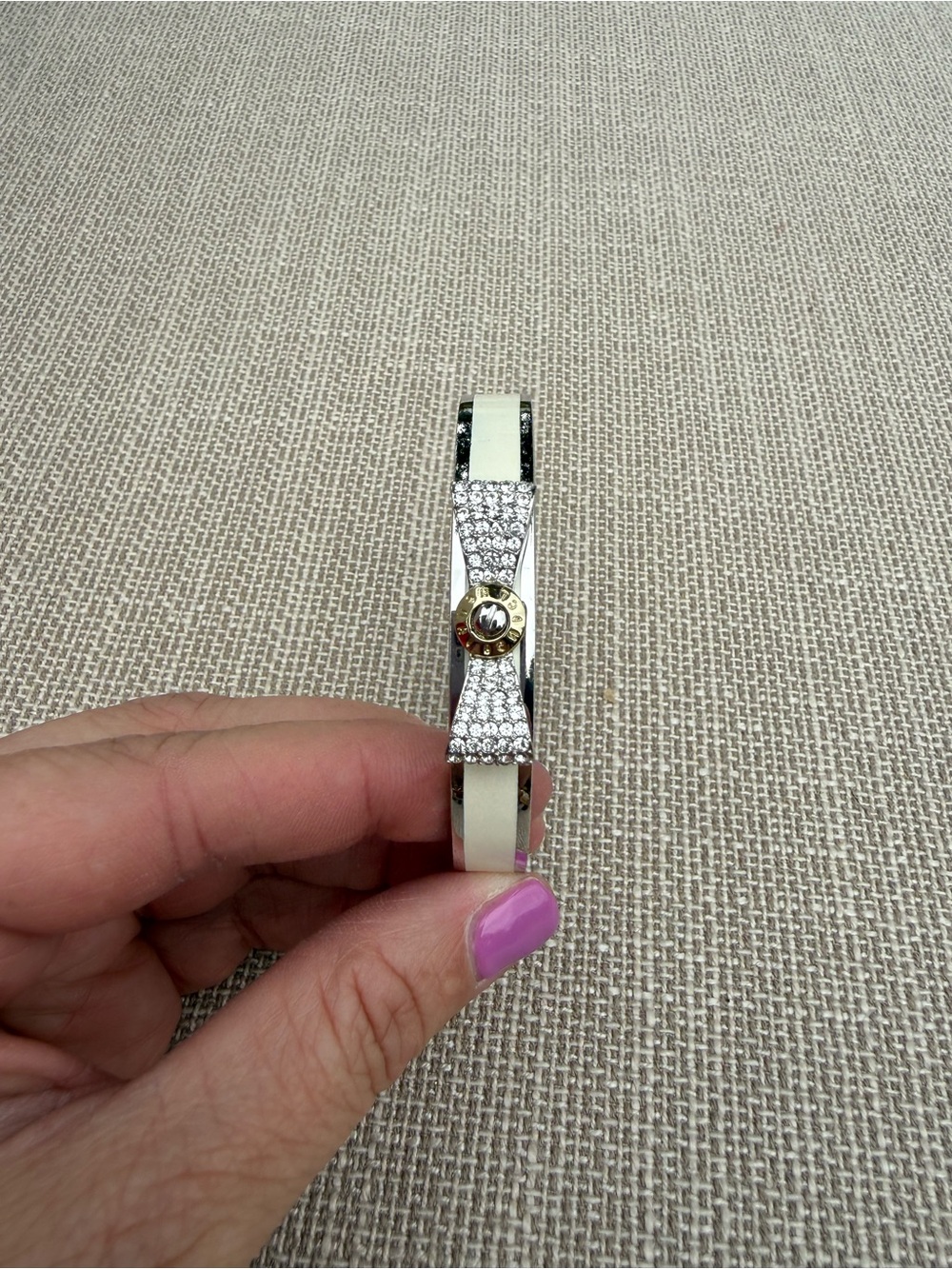 Henri Bendel Elegant Crystal Bow Bangle Bracelet in Cream and Gold